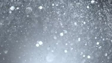 Gümüş Parıltılı Arkaplan 'ın Süper Yavaş Çekimi, 1000fps. 4K Çözünürlükte Yüksek Hız Sinema Kamerası ile Çekildi.