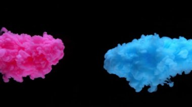 Sudaki renk mürekkeplerinin süper yavaş çekimi. 4K 'da yüksek hızlı kamerayla çekilmiş..