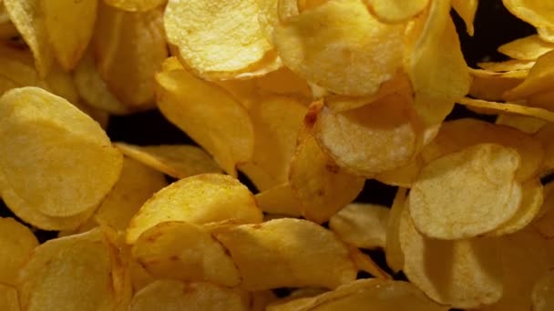 Super Slow Motion Shot Potato Chips Flies Being Exploded Black — Stock Video
