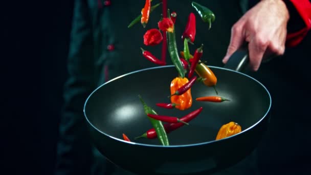 Super Slow Motion Shot Chef Holding Fring Pan Falling Chilli — стоковое видео