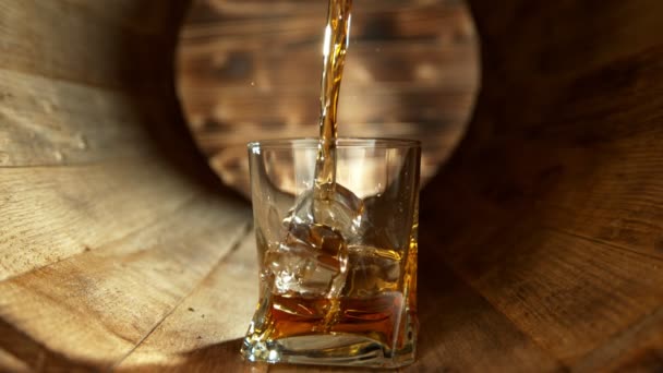 Super Slow Motion Shot Pouring Whiskey Glass Ice Cubes Wooden — Stock Video