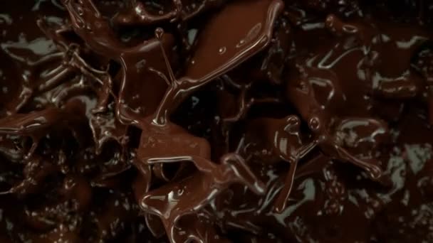 Super Slow Motion Shot Splashing Melted Chocolate Background 1000 Fps — Stock Video