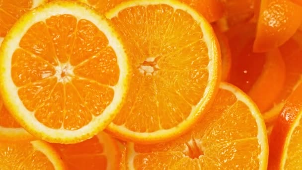 Super Slow Motion Shot Van Flying Fresh Orange Slices Camera — Stockvideo