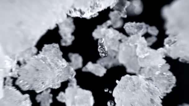 Super Slow Motion Shot Falling Crushed Ice Black Background Ved – stockvideo