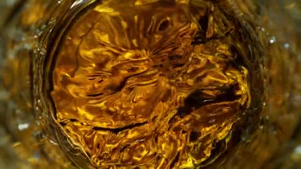 Super Slow Motion Detail Shot Whiskey Waving Glass Pada 1000Fps — Stok Video
