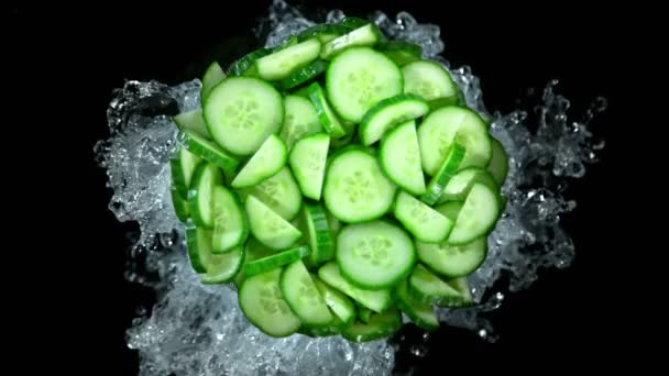 Super Slow Motion Shot Fresh Cucumber Cuts Water Splash Isolated — Stok Video