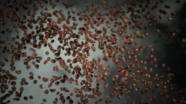 Super Slow Motion Shot Coffee Beans Flying Camera Dark Foundation — стоковое видео