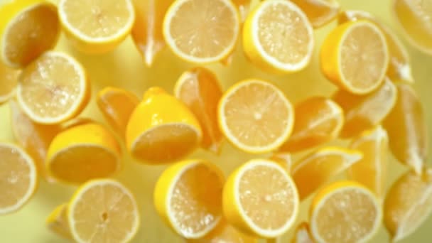 Super Slow Motion Shot Van Flying Fresh Lemon Slices Camera — Stockvideo