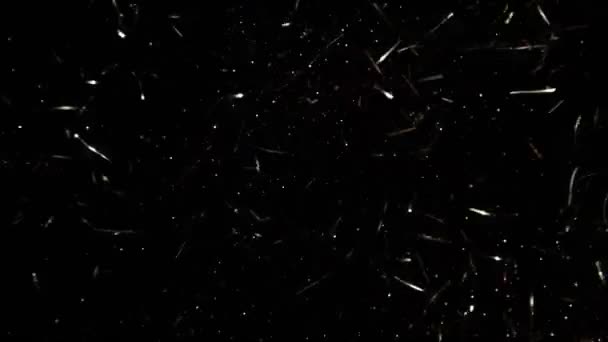 超级慢镜头金光闪闪的Confetti背景在1000Fps 用4K解像度的高速电影摄影机拍摄 — 图库视频影像