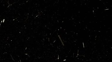 Süper Yavaş Çekim Altın Işıldayan Konfeti Arkaplanı 1000fps. 4K Çözünürlükte Yüksek Hız Sinema Kamerası ile Çekim.
