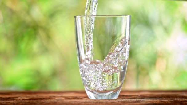 Super Slow Motion Shot Pouring Pure Water Glass Green Natural — Video