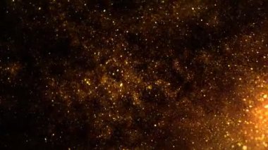 Super Slow Motion Shot of Golden Glittering Particle Background on Black at 1000fps. Filmed with High Speed Cinema Camera in 4K Resolution.
