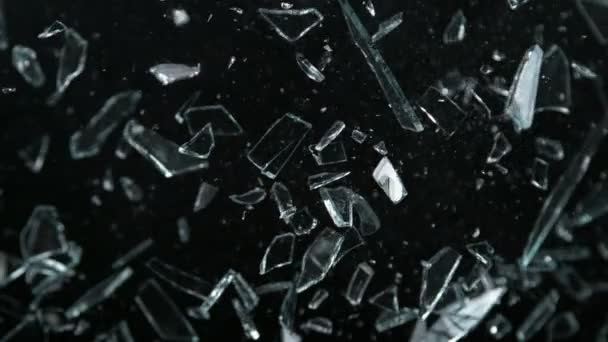 Super Slow Motion Shot Glass Shards Flying Camera Isolated Black — Stock Video