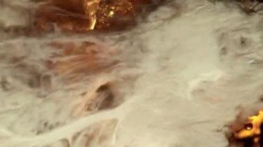 Super Slow Motion Abstract Shot of Pouring Cream into Coffee at 1000fps. Filmed on high speed cinema camera in 4k..