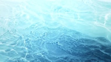 Super Slow Motion Abstract Shot of Waving Blue Clear Water Surface at 1000fps. Filmed on high speed cinema camera in 4k..