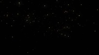 Altın Parıldayan Parçacık Arkaplanının Süper Yavaş Çekimi, 1000fps. 4K Çözünürlükte Yüksek Hız Sinema Kamerası ile Çekim.