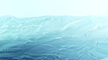 Super Slow Motion Abstract Shot of Waving Blue Clear Water Surface at 1000fps. Filmed on high speed cinema camera in 4k..
