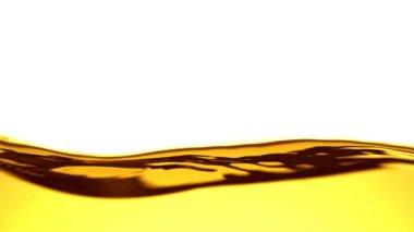 Sallanan Altın Sıvı Arkaplan 'ın 1000 fp' lik Süper Yavaş Çekimi. Yüksek Hız Sinema Kamerası ile 4K çözünürlükte çekilmiştir.