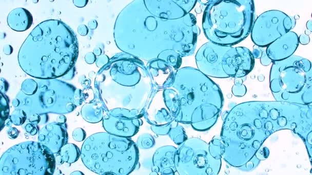 Super Slow Motion Shot Moving Blue Bubbles Isolated White Foundation — стоковое видео