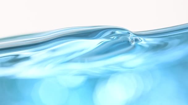 Super Slow Motion Shot Waving Blue Gel Liquid Isolated White — Vídeo de Stock