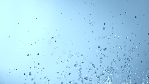 Super Slow Motion Abstract Shot Splashing Water Drops Light Blue — Vídeos de Stock