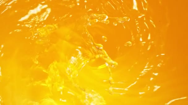 Super Slow Motion Shot Pouring Fresh Orange Juice Whirl 1000 — Stock video