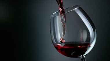 Super Slow Motion Shot of Pouring Red Wine into Glass at 1000fps. Filmed on High Speed Cinema Camera in 4K.