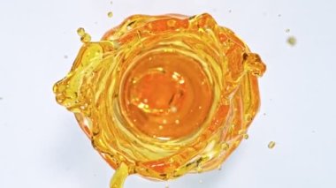 Super Slow Motion Shot of Oil Vortex Splash Liquid at 1000fps. Filmed with High Speed Cinema Camera in 4K resolution.