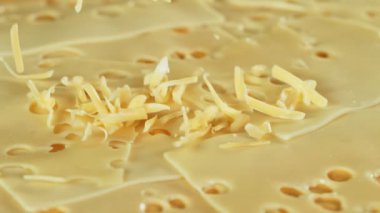 Super Slow Motion Shot of Falling Grated Cheese at 1000 fps. Filmed with High Speed Cinema Camera at 4K.