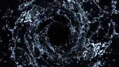 Super Slow Motion Shot of Rotating Water Splash Isolated on Black Background at 1000fps. Filmed with High Speed Cinema Camera at 4K Resolution.