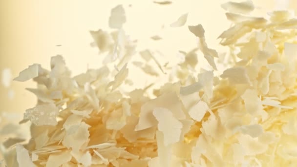 Super Slow Motion Shot Flying Parmesan Shavings Black Background 1000 — Vídeo de stock