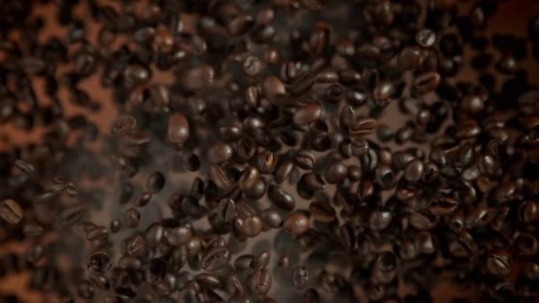 Super Slow Motion Shot Coffee Beans Smoke Flying Camera Brown — Stockvideo
