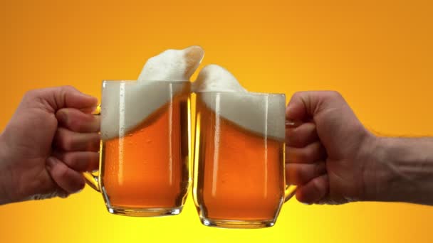 Super Slow Motion Shot Beer Glasses Cheering Orange Gradient Background — Stok Video