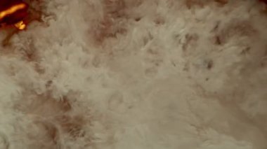 Super Slow Motion Abstract Shot of Pouring Cream into Coffee at 1000fps. Filmed on high speed cinema camera in 4k..