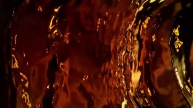 Super Slow Motion Shot of Waving Coffee Liquid Surface at 1000fps. Filmed with High Speed Cinema Camera, 4k.