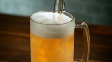 Super Slow Motion Shot of Pouring Beer with Camera Motion From Detail at 1000fps. Filmed with High Speed Cinema Camera in 4K.