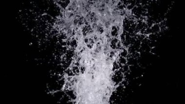 Super Slow Motion Shot of Real Water Splash Explosion from Isolated on Black at 1000fps. Filmed on high speed cinema camera in 4k..