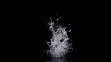 Super Slow Motion Shot of Real Water Splash Explosion from Isolated on Black at 1000fps. Filmed on high speed cinema camera in 4k..