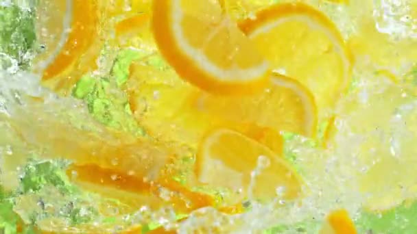 Super Slow Motion Shot Fresh Lemon Slices Falling Water Whirl — Stock Video