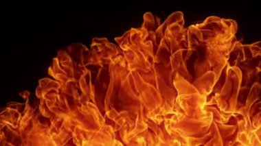 Çok Yavaş Çekilen Ateş Arkaplanı, 1000fps 'de siyahta izole edildi. Yüksek Hız Sinema Kamerası, 4K.