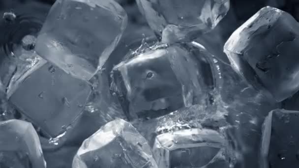 Super Slow Motion Shot Falling Splashing Perfect Ice Cubes Water — Vídeos de Stock