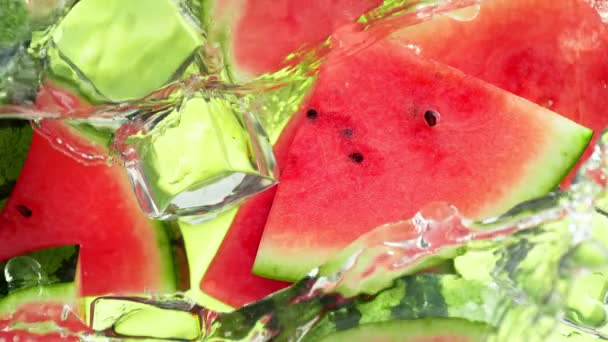 Super Slow Motion Shot Water Wave Splashing Watermelon Slices Ice — Vídeos de Stock