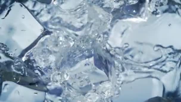 Super Slow Motion Shot Falling Splashing Perfect Ice Cubes Water — Vídeo de stock