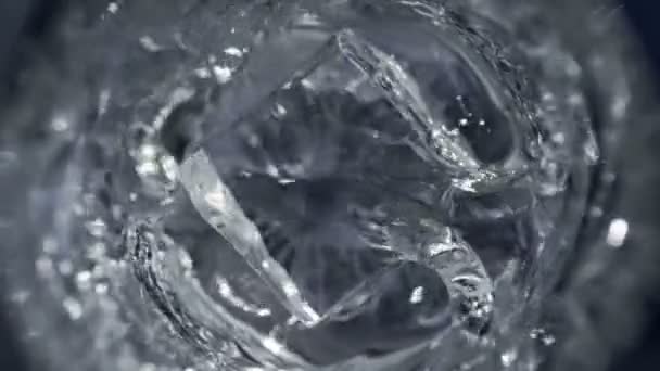 Super Slow Motion Detail Shot Ice Cube Falling Glass Vodka — Stock video
