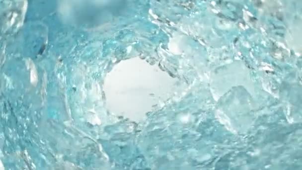 Super Slow Motion Shot Clear Water Ice Cubes Rotating Wave — Vídeos de Stock