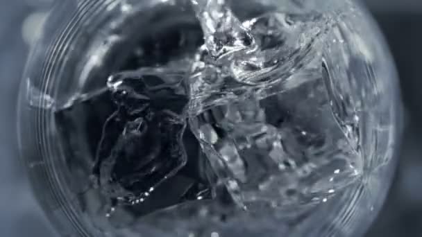 Super Slow Motion Shot Pooring Vodka Crystal Clear Ice Cubes — стоковое видео