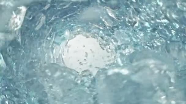 Super Slow Motion Shot Clear Water Ice Cubes Rotating Wave — Stock video