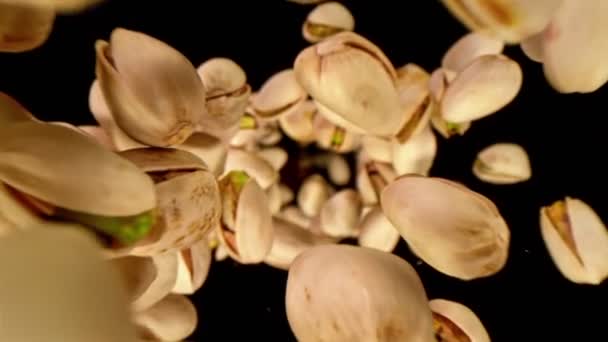 Super Slow Motion Shot Fresh Roasted Pistachio Nuts Flying Camera — Stock Video