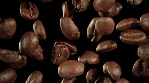 Super Slow Motion Macro Shot Flying Premium Coffee Beans Isolato — Video Stock