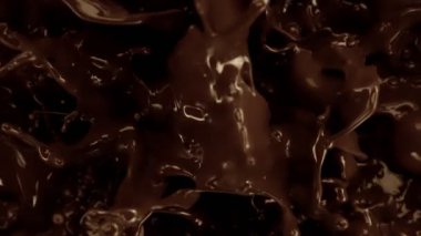Su Sıçratan Erimiş Çikolata 'nın Süper Yavaş Çekimi 1000 fps' de. Yüksek Hız Sinema Kamerası, 4K.
